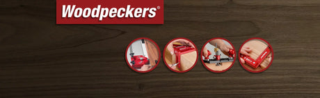 Outils d'ébénisterie Woodpeckers rouges utilisés sur bois, fond texture bois clair